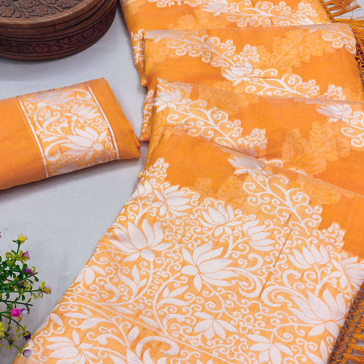 Orange Floral Woven Banarasi Silk Saree With Tassels