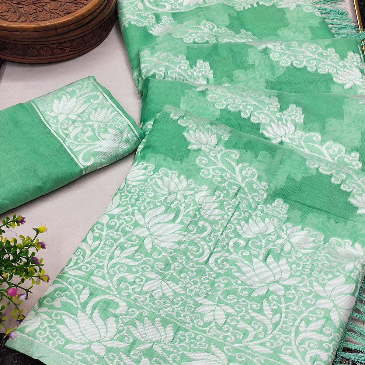 Rama Green Floral Woven Banarasi Silk Saree With Tassels