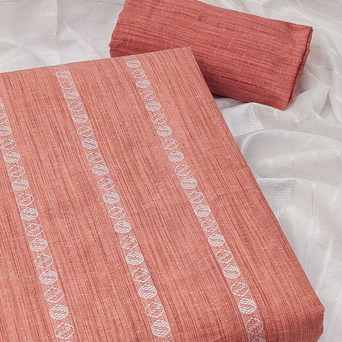 Intricate Weaving Work on Peach Pure Cotton Dress Material
