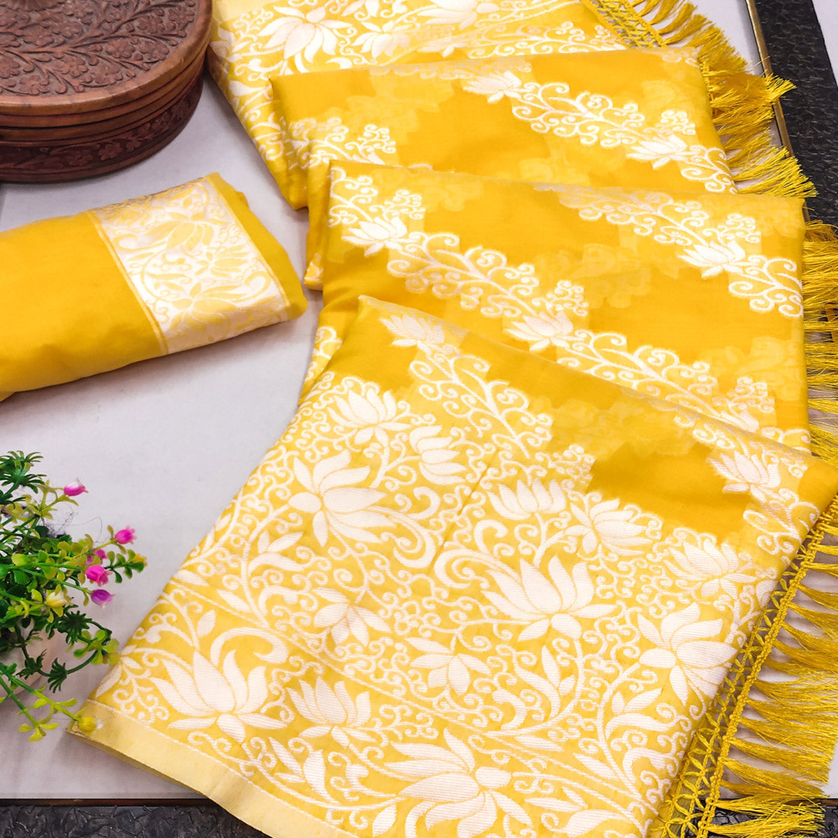 Radiant Yellow Woven Silk Saree with Floral Accents