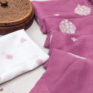 Pink Embroidered Chiffon Saree With Elegant Tassel Borders
