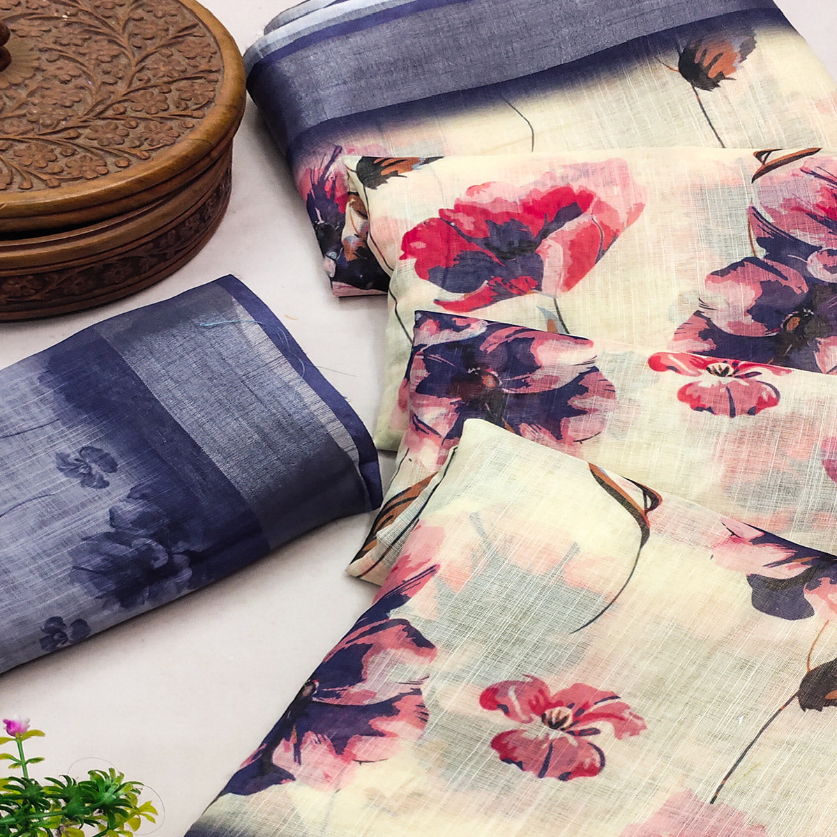 Cream Linen Printed Saree Adorned with Florals and Subtle Zari Trim