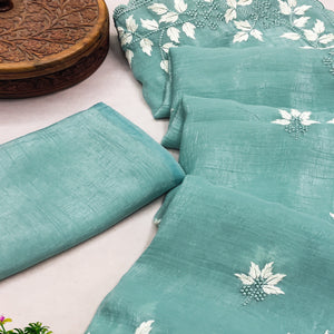 Turquoise Organza Saree Featuring Fine Floral Embroidery