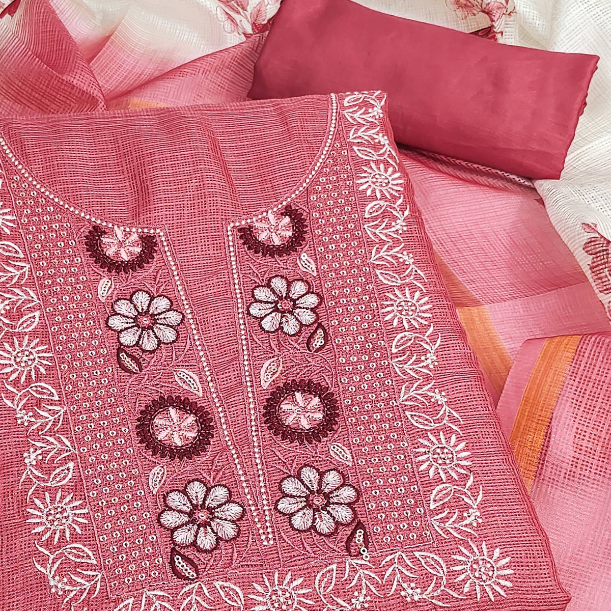 Peach Kota Doria Fabric with Beautifully Embroidered Floral Designs
