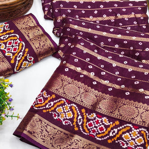 Deep Purple Bandhani Printed Dola Silk Saree Enhanced With Fine Weaving Accents