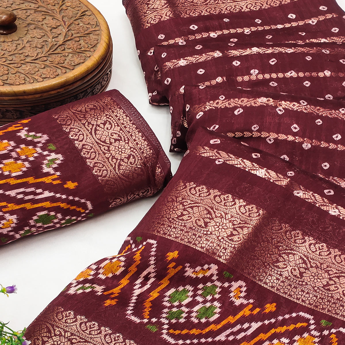 Maroon Bandhani Printed Dola Silk Saree Enhanced With Fine Weaving Accents