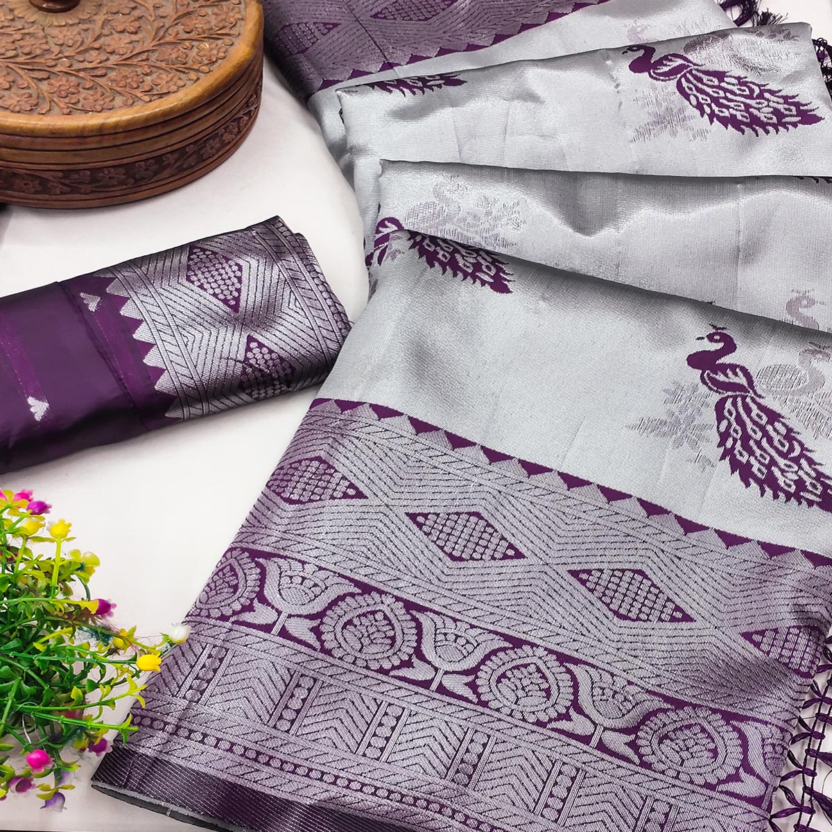Grey Banarasi Silk Saree Featuring Zari Weaving Peacock Pattern & Luxe Tassels