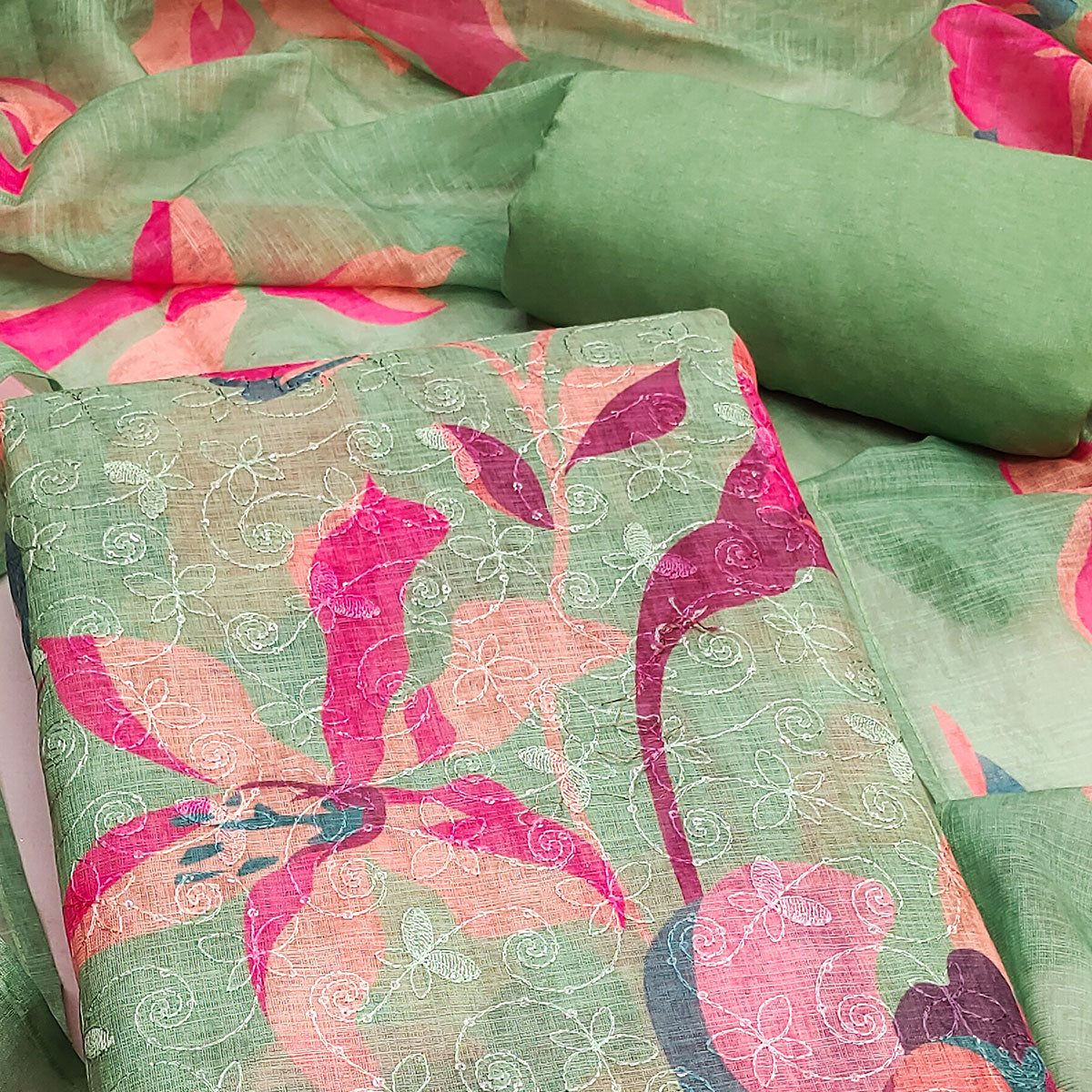 Green Linen Dress Material Adorned with Artistic Floral Print and Elegant Thread Embroidery