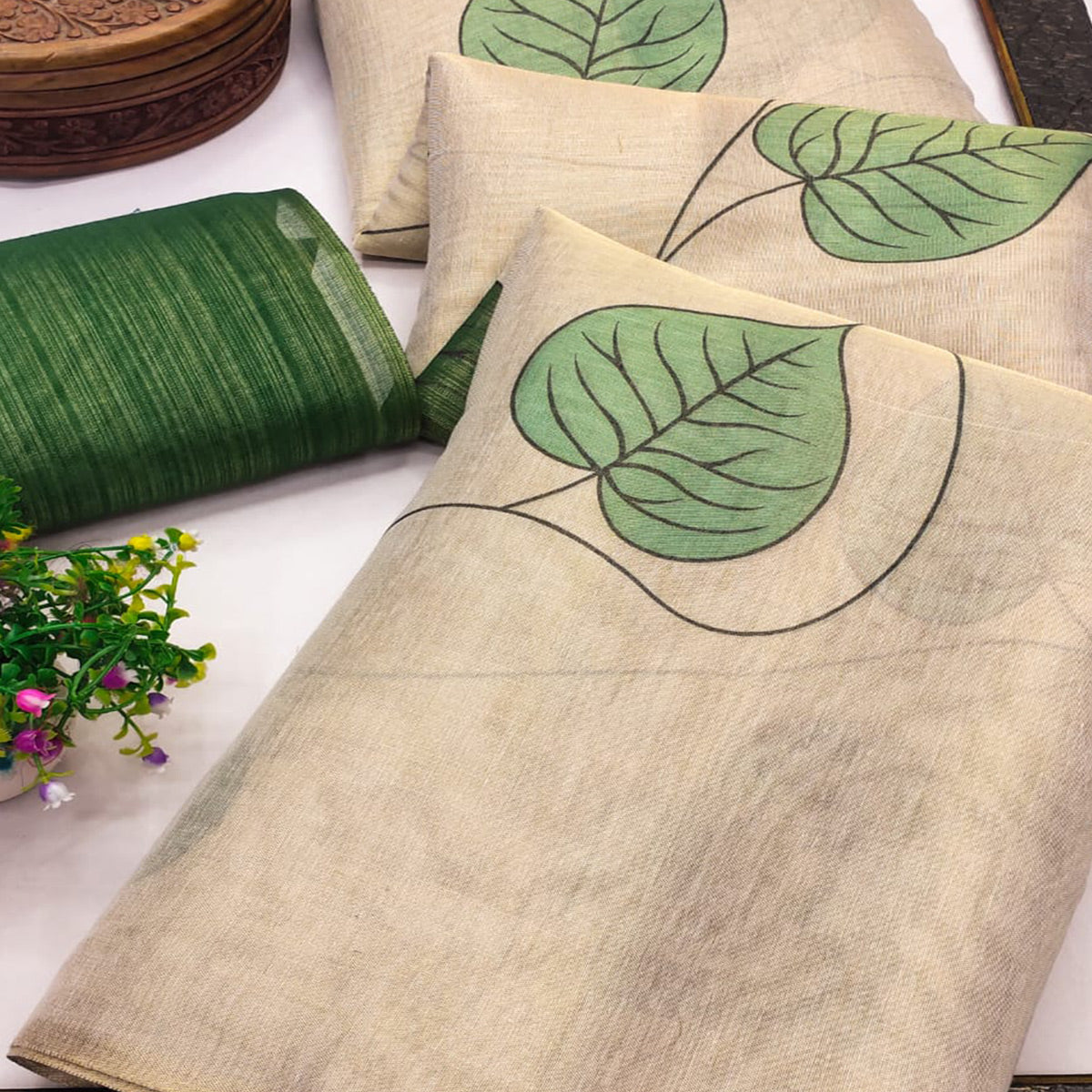 Beige & Green Saree in Art Silk Featuring Leafy Print & Tassels