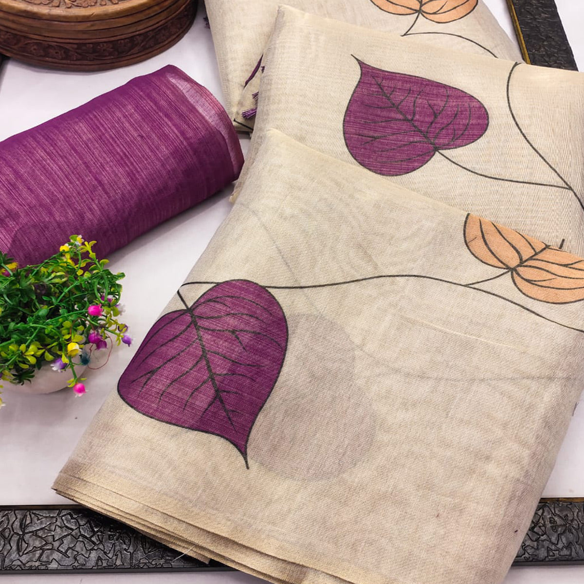 Beige & Purple Saree in Art Silk Featuring Leafy Print & Tassels
