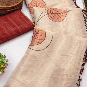 Beige & Rust Saree in Art Silk Featuring Leafy Print & Tassels