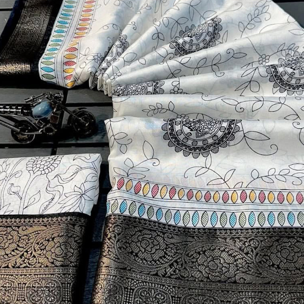 White Woven Border Floral Print Dola Silk Saree for Festive Wear