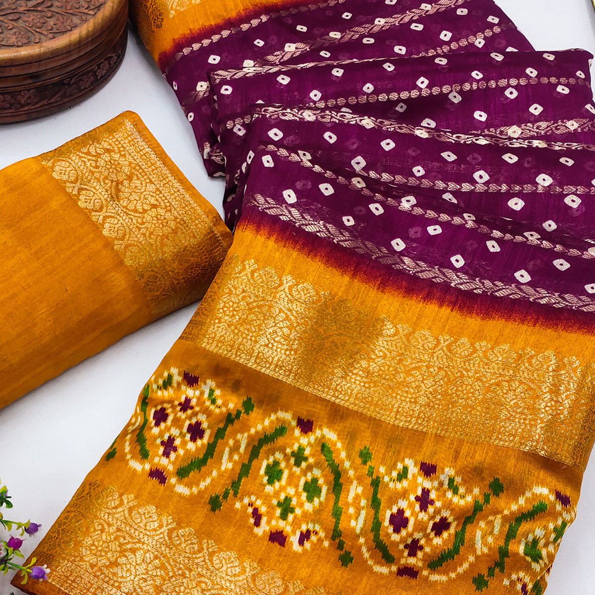 Wine Dola Silk Saree With Traditional Bandhani Motifs & Intricate Zari Weaving Elegance