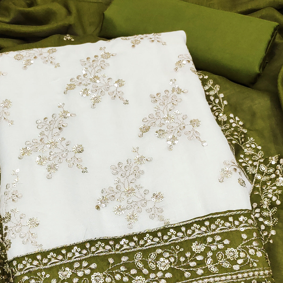 Green and Off White Vichitra Silk Fabric with Embroidered Detailing