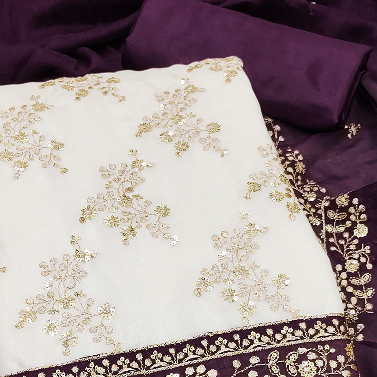 Purple and Off White Vichitra Silk Fabric with Embroidered Detailing
