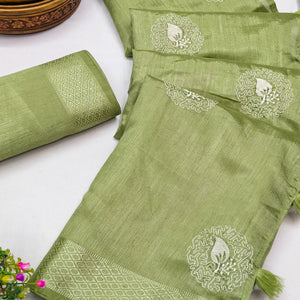 Pista Green Embroidered Art Silk Saree Adorned with Classic Zari Weaving Details