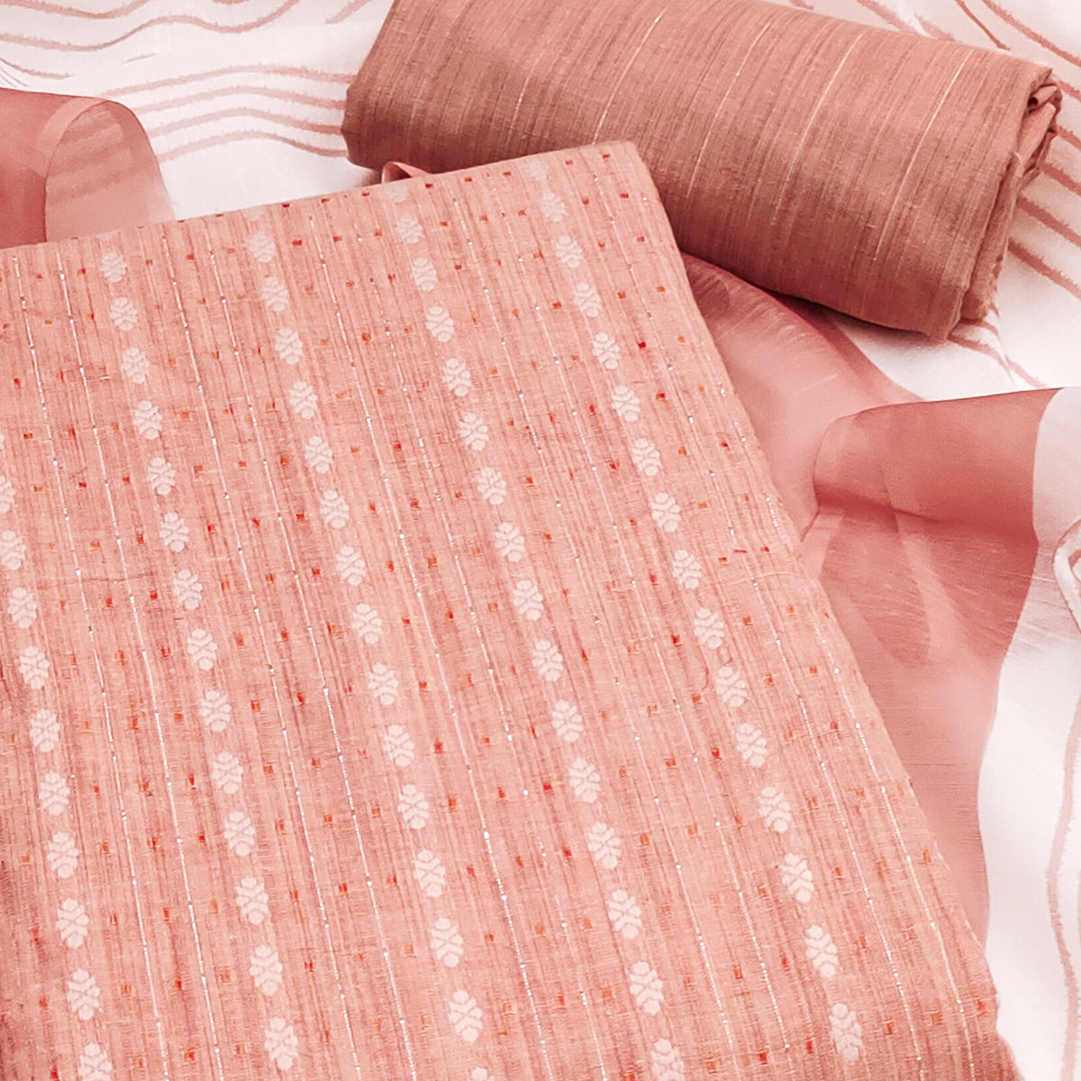 Classic Peach Pure Cotton Dress Material Featuring Intricate Weaving