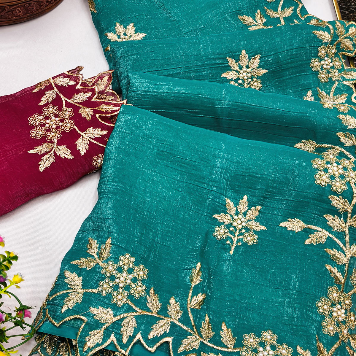 Regal Turquoise Chiffon Saree Adorned with Intricate Golden Embroidery