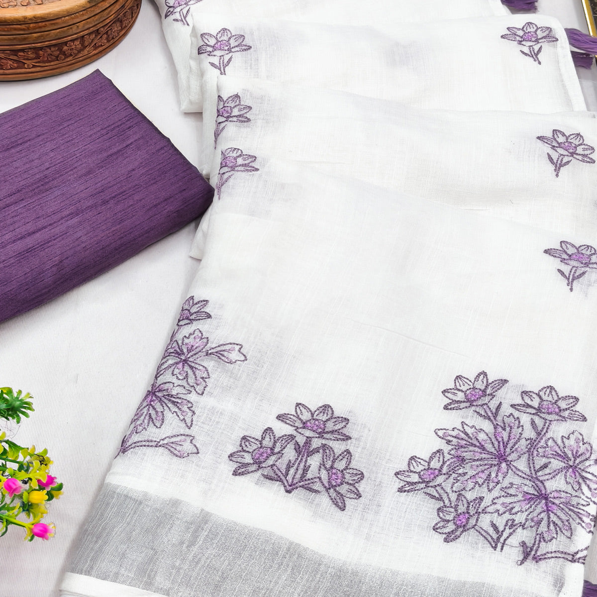 White & Lavender Floral Embroidered Linen Saree Perfect for Festive Occasions