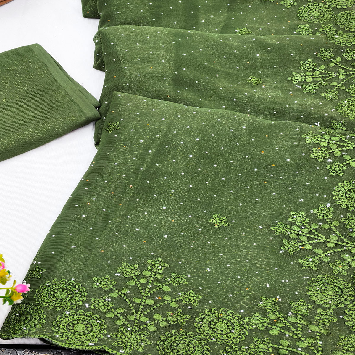 Green Chiffon Saree Featuring Delicate Floral Embroidery & Shimmering Stone Work