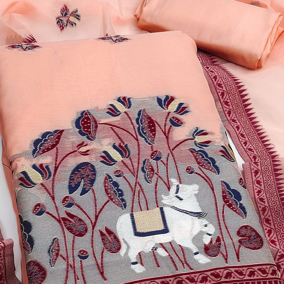 Premium Peach Chanderi Silk Weaving Dress Material With Artistic Floral & Animal Motifs