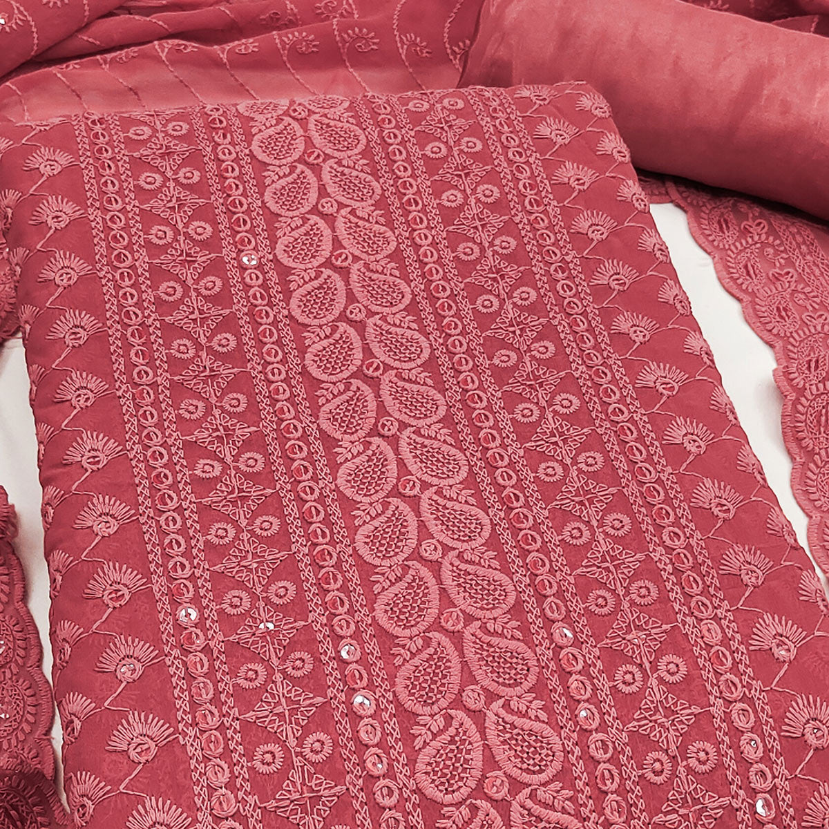 Lightweight Peach Georgette Dress Material Adorned with Beautiful Floral Embroidery