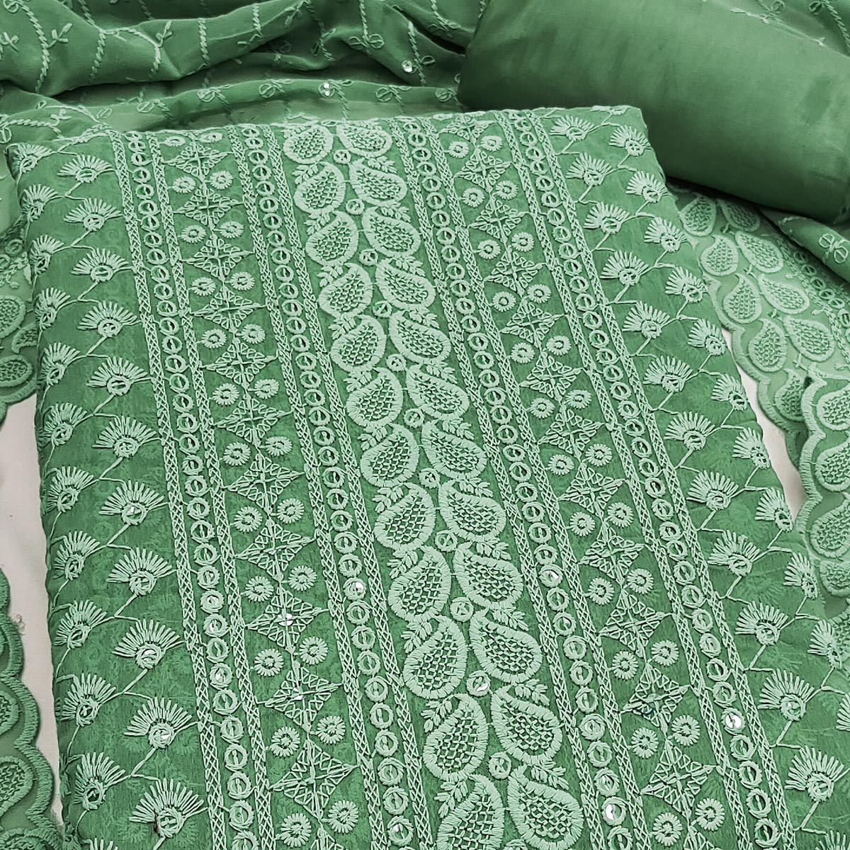 Lightweight Pista Green Georgette Dress Material Adorned with Beautiful Floral Embroidery