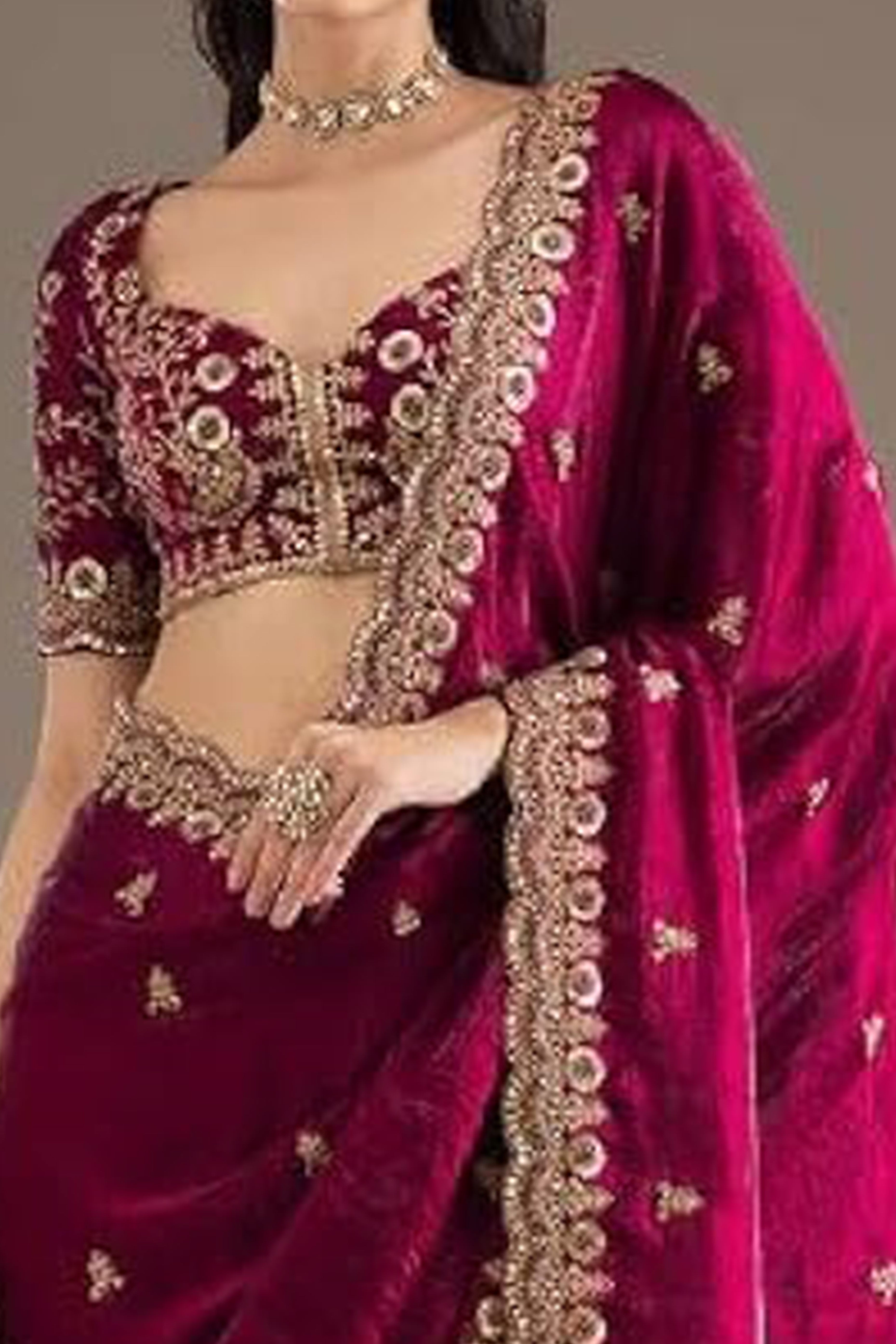 Trendy Rani Pink Fancy Satin Saree Enhanced With Rich Golden Embroidered Design