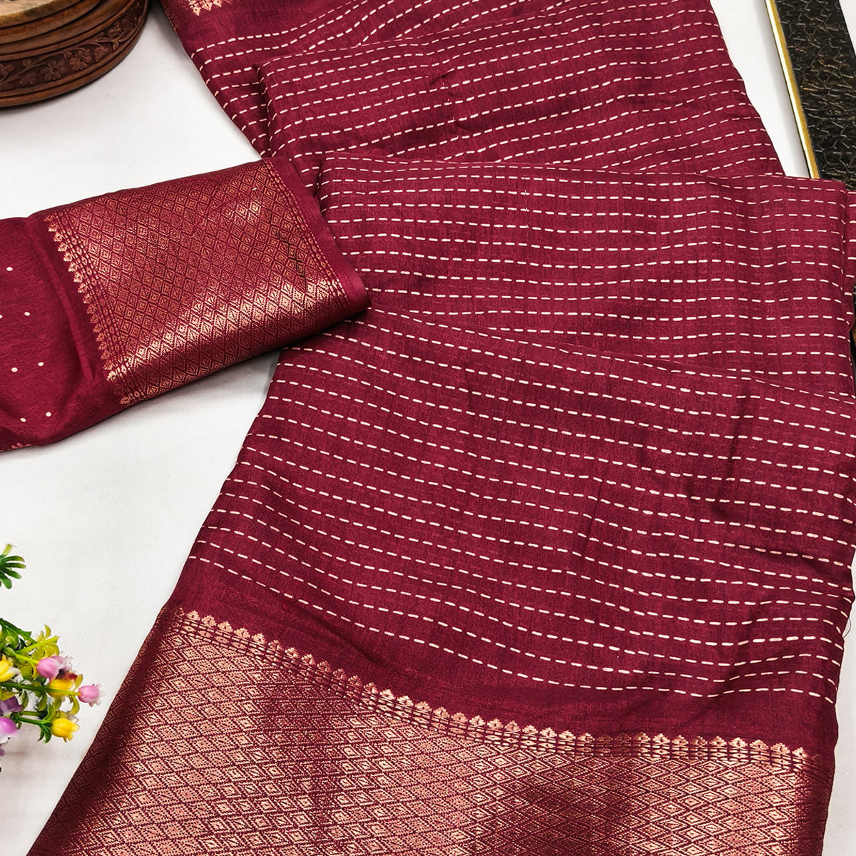 Stylish Maroon Striped Print Dola Silk Saree Adorned With Textured Weaving Border
