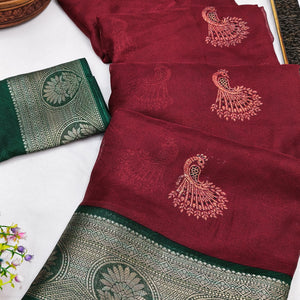 Festive Maroon Dola Silk Saree Enhanced with Ornate Zari Weaving