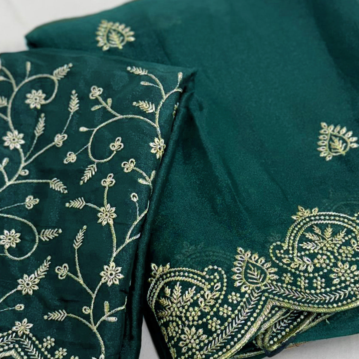 Gorgeous Teal Green Floral Embroidered Georgette Saree Accented With Luxurious Zari Work