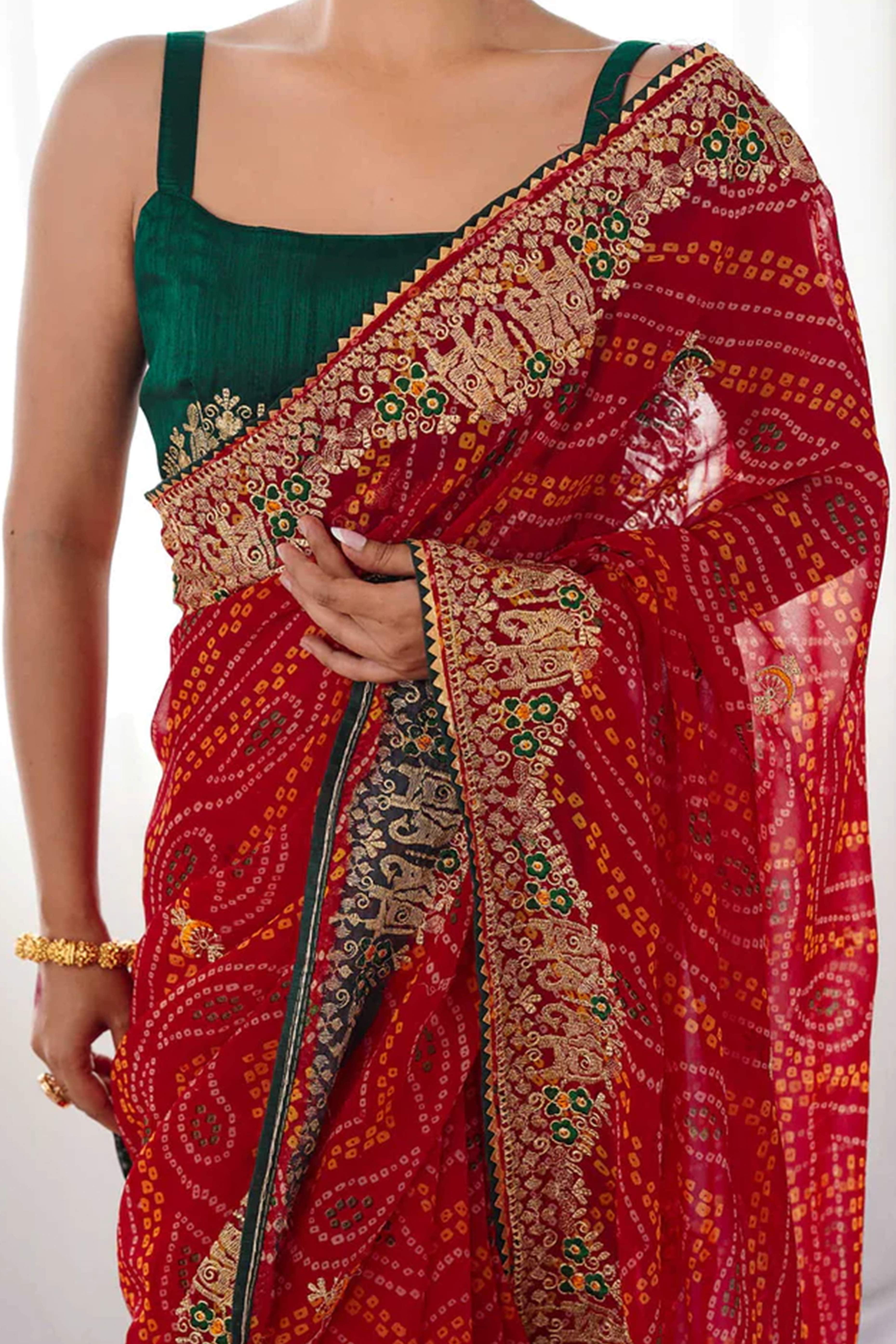 Classic Red Bandhani Print Georgette Saree Enhanced With Intricate Zari Embroidered Border Detailing