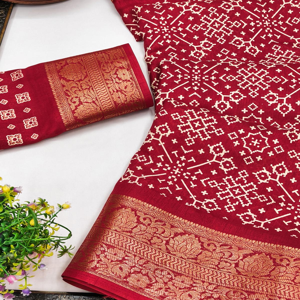 Contemporary Red Geometric Mill Printed Dola Silk Saree With Ornate Floral Zari Border