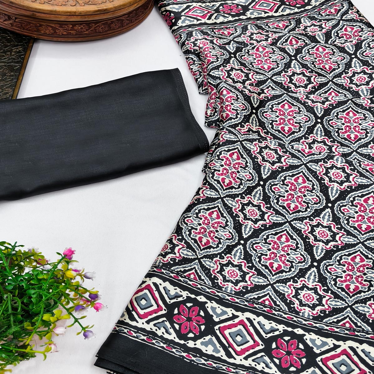 Charming Black Mill Printed Crepe Silk Saree Adorned With Vibrant Floral Design
