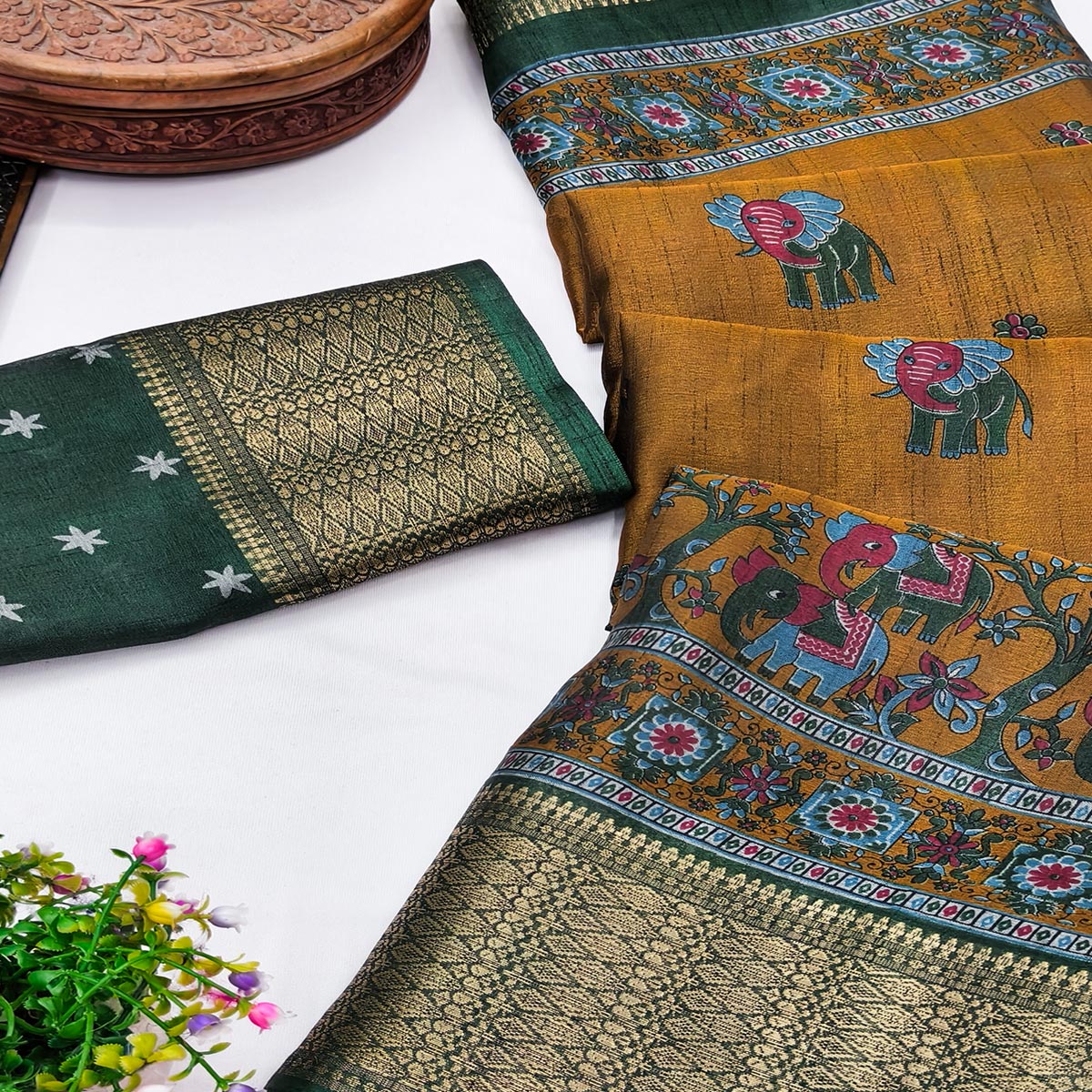 Majestic Mustard Elephant & Floral Printed Dola Silk Saree Featuring Intricate Weaving Border