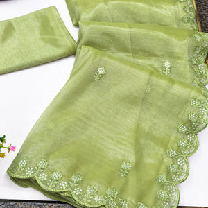 Green Net Partywear Saree Featuring Fine Floral Embroidery and a Soft, Flowing Look
