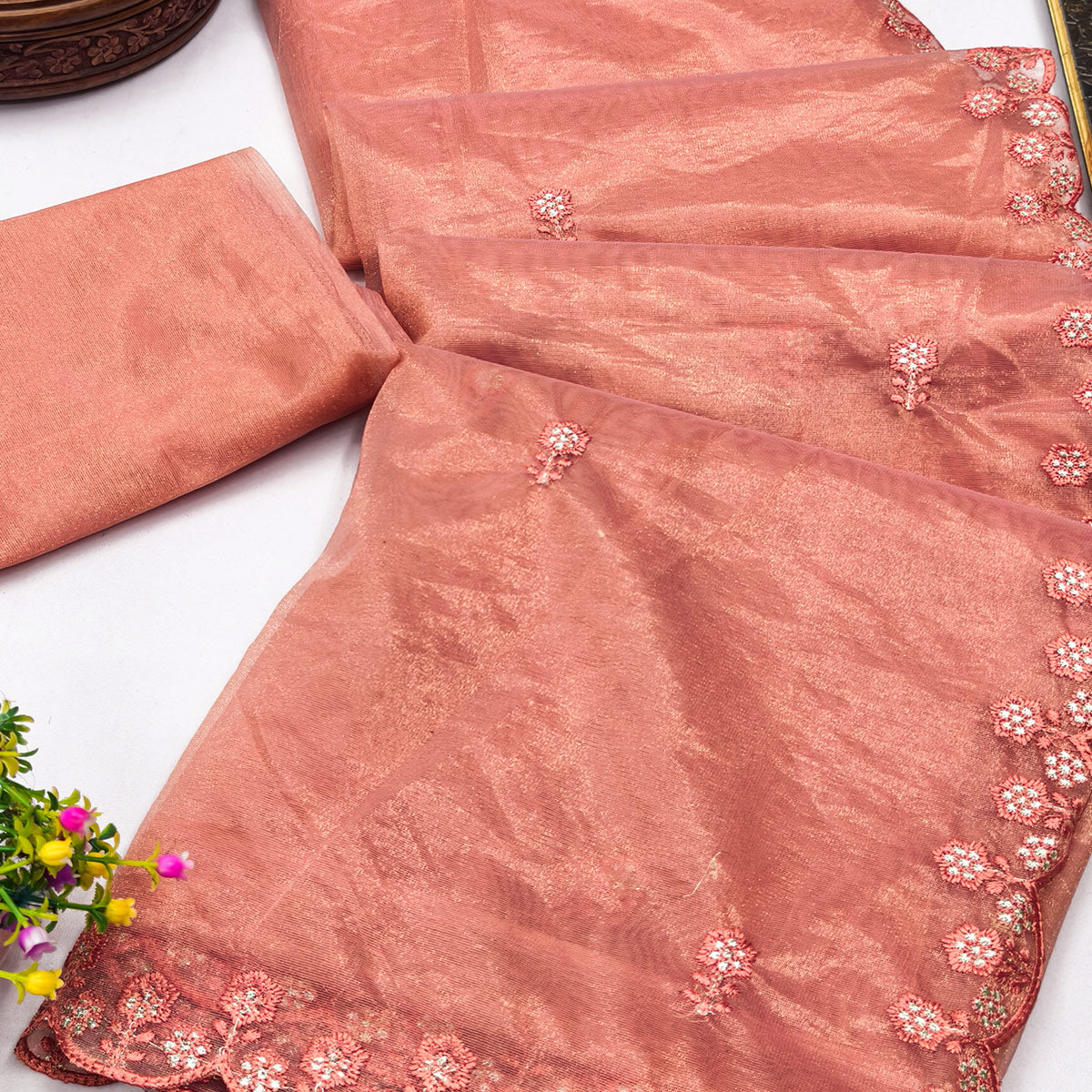 Peach Net Partywear Saree Featuring Fine Floral Embroidery and a Soft, Flowing Look