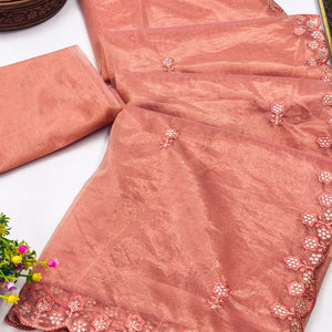 Peach Net Partywear Saree Featuring Fine Floral Embroidery and a Soft, Flowing Look