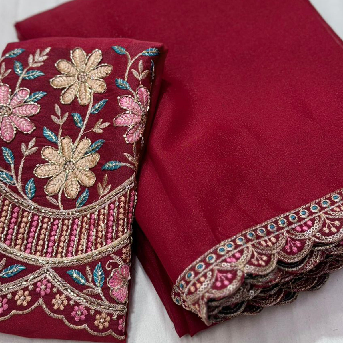 Maroon Solid Georgette Saree With Embroidered Blouse Piece And Embroidered Border