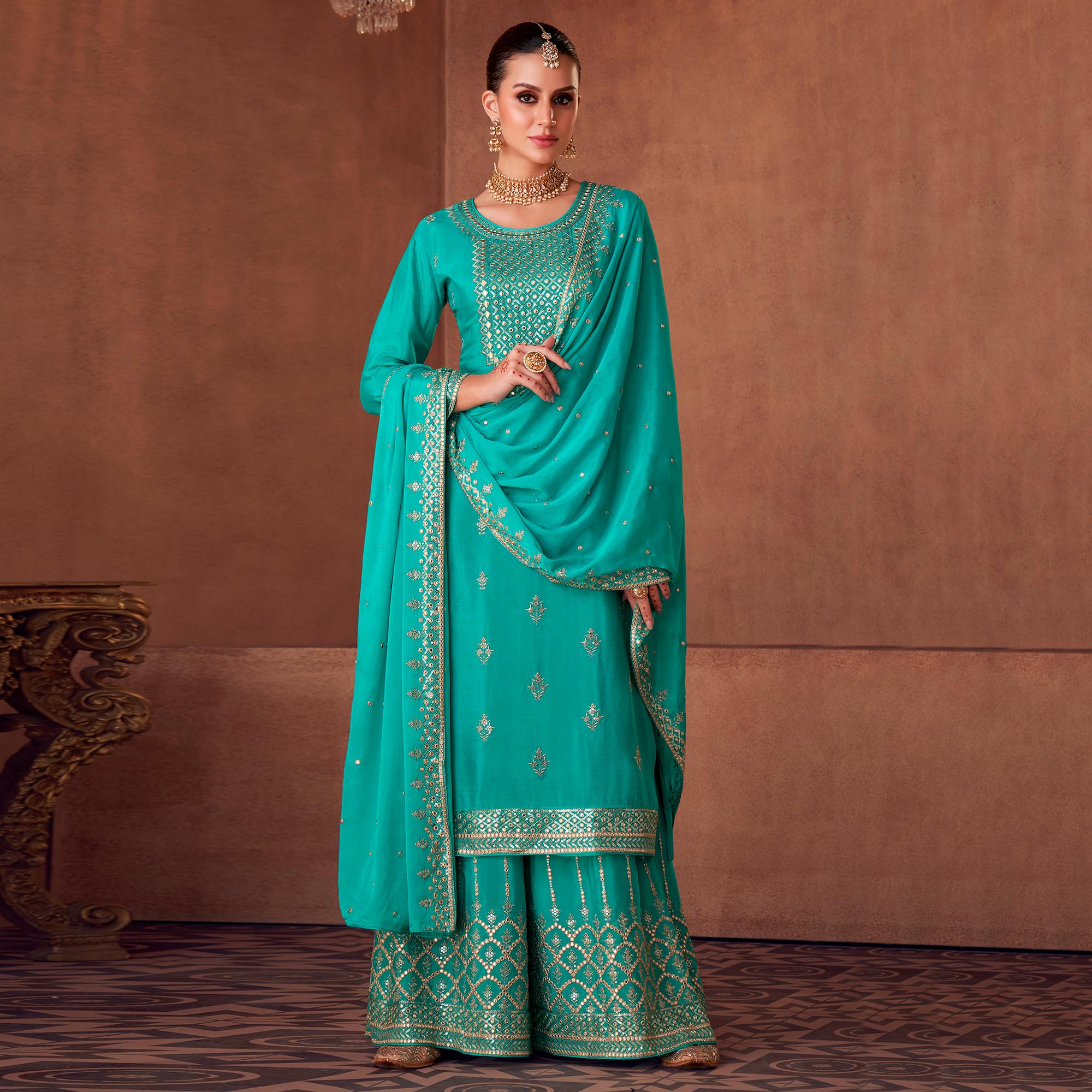 Turquoise Floral Sequins Embroidered Georgette Semi Stitched Palazzo Suit