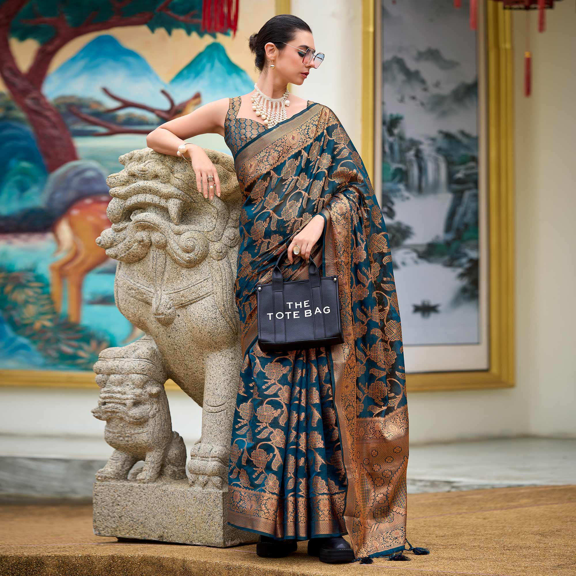 Teal Floral Motifs Woven Organza Saree