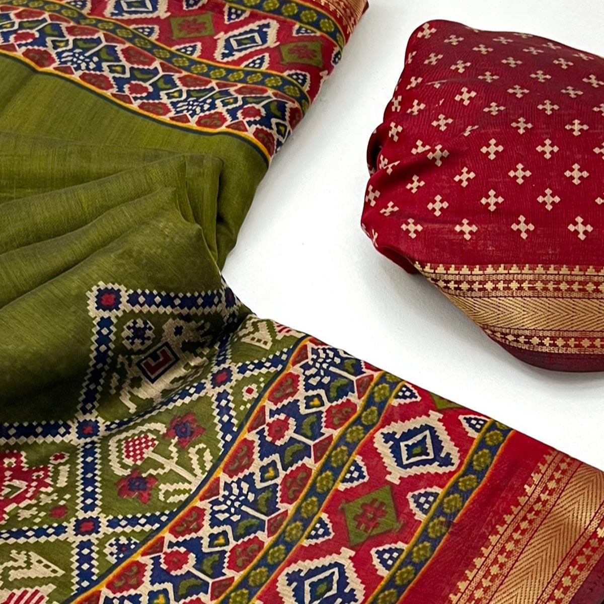 Green Patola Print Saree in Featherlight Mulmul Cotton with Zari Border