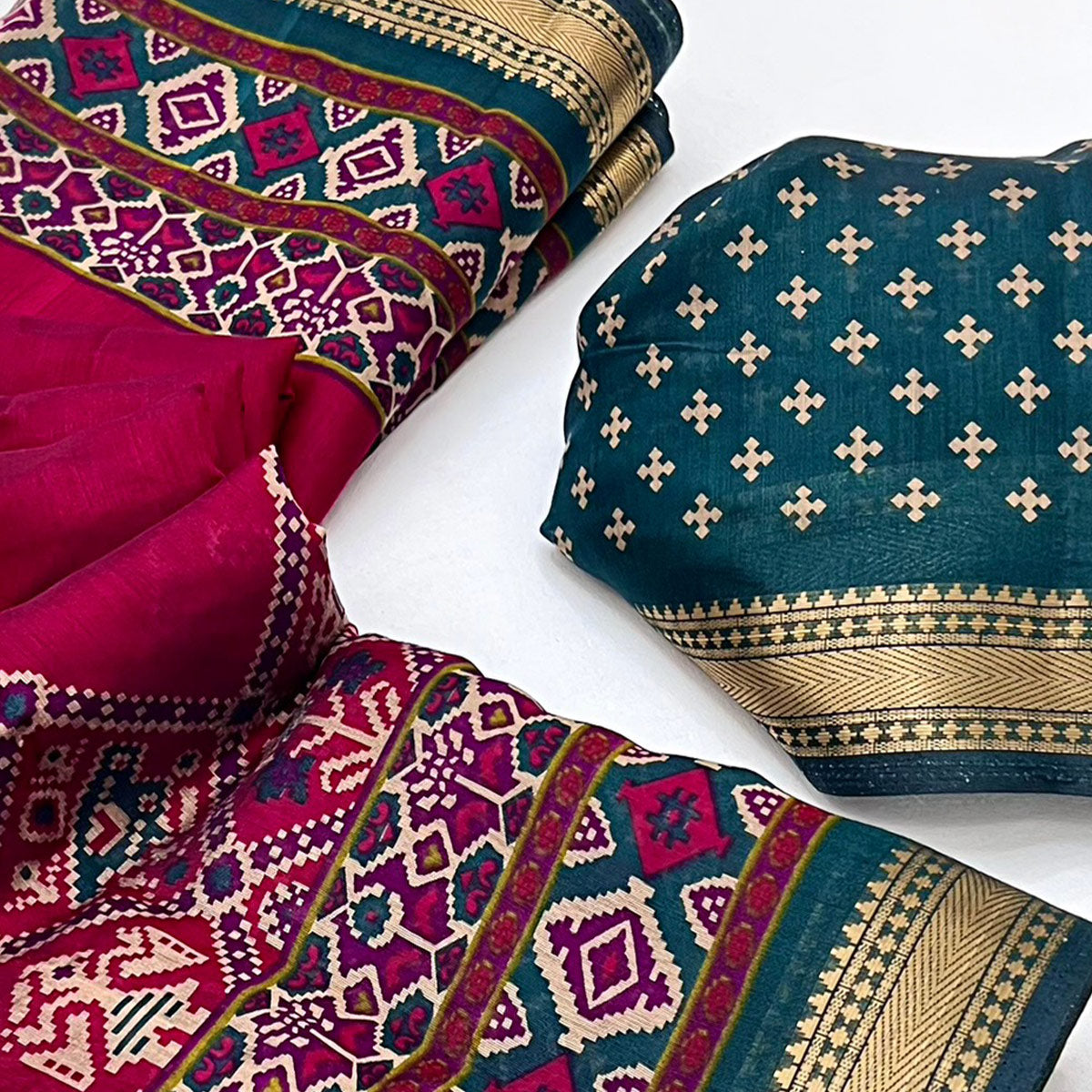 Pink Patola Print Saree in Featherlight Mulmul Cotton with Zari Border