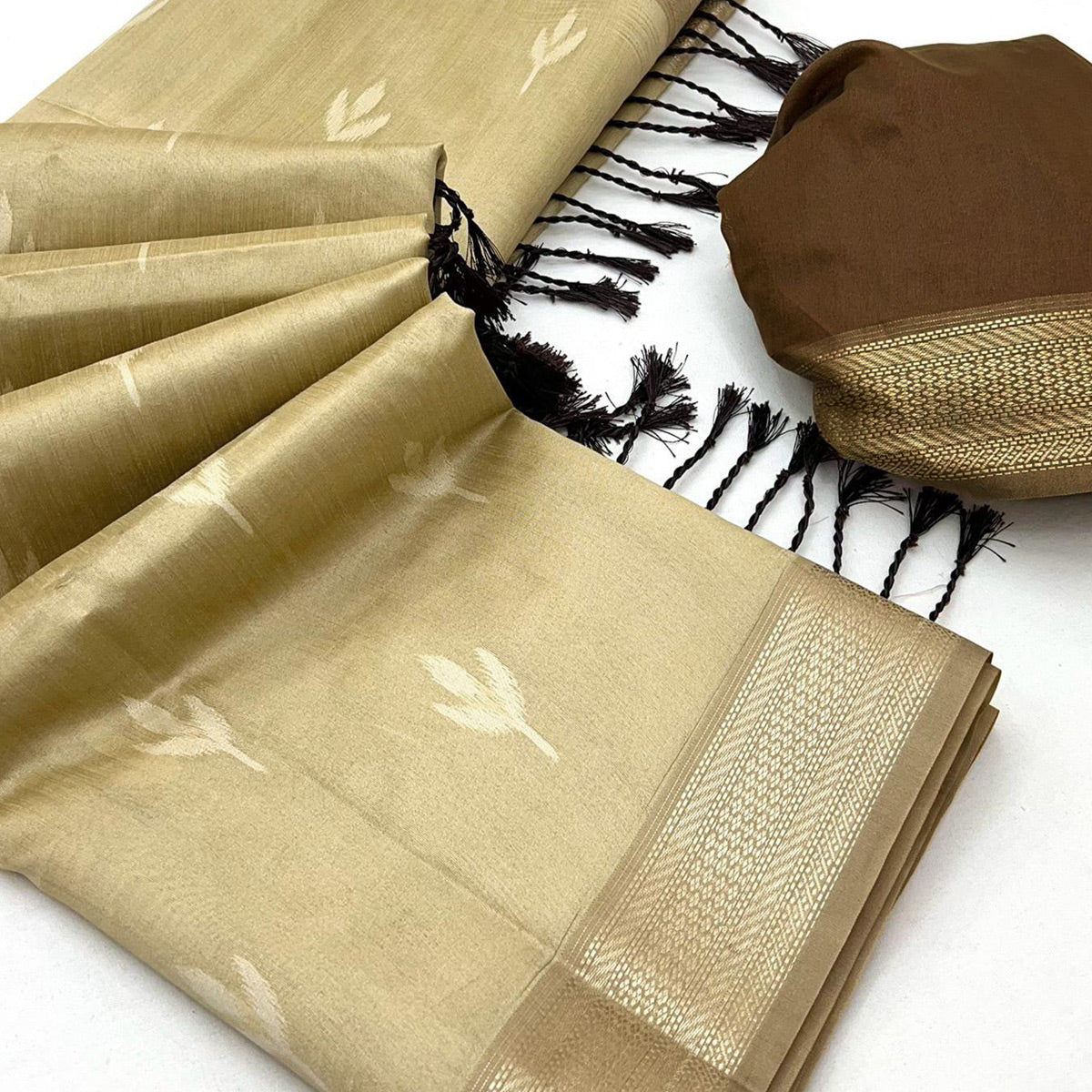 Beige Ikkat Style Rayon Silk Saree with Luxurious Zari Border and Delicate Tassels