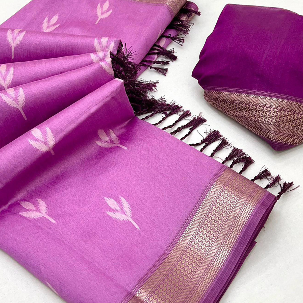 Purple Ikkat Style Rayon Silk Saree with Luxurious Zari Border and Delicate Tassels