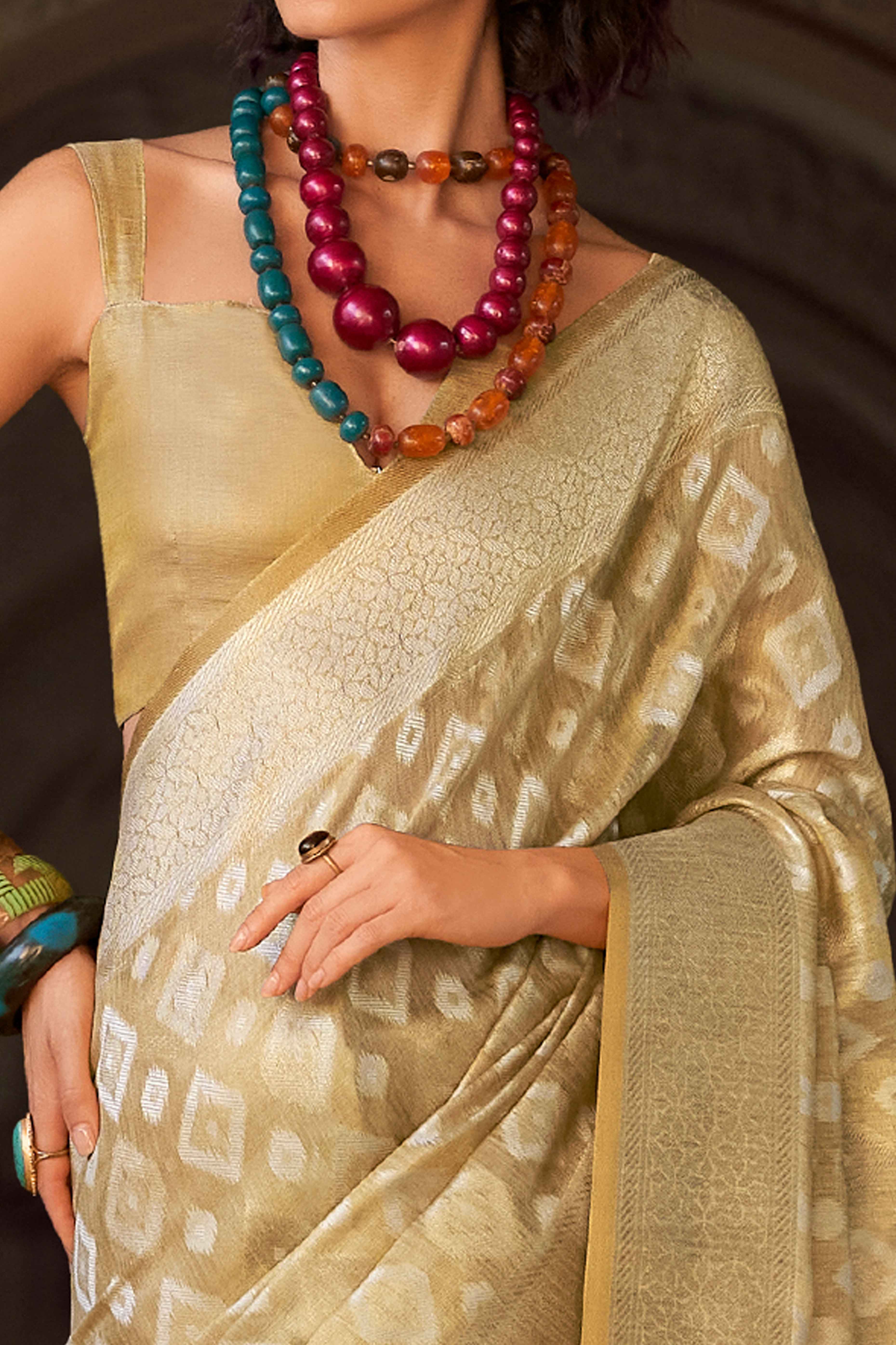 Chikoo Geometric Pattern Woven Tissue Silk Saree