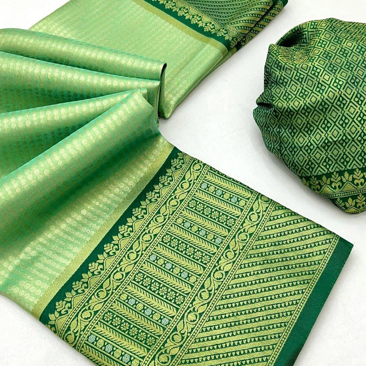 Green Tissue Silk Saree with Delicate Floral Zari Weaving