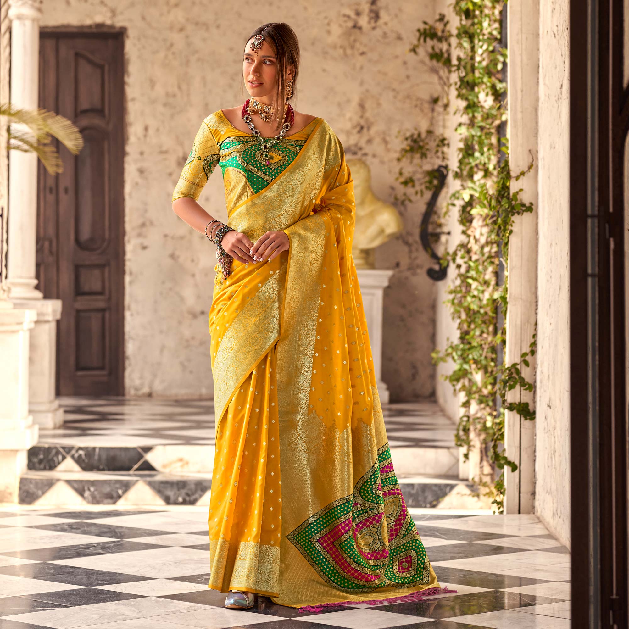 Yellow Floral Woven Banarasi Silk Saree With Tassels