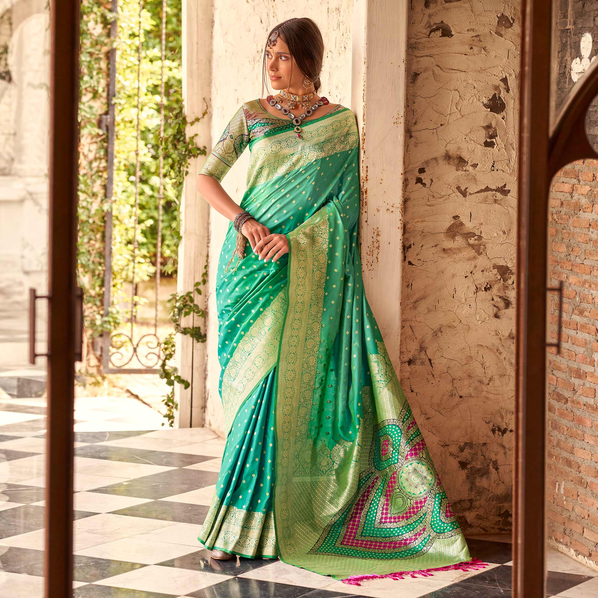 Rama Green Floral Woven Banarasi Silk Saree With Tassels