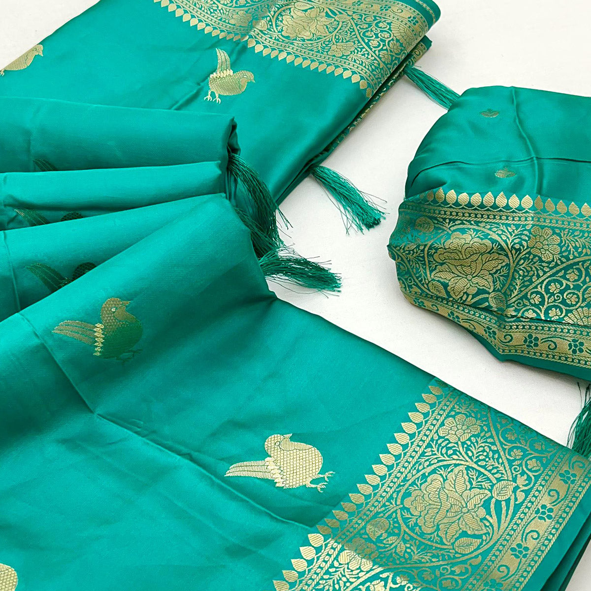 Rama Green Satin Silk Saree With Zari Woven Bird Motifs & Elegant Tassel Border